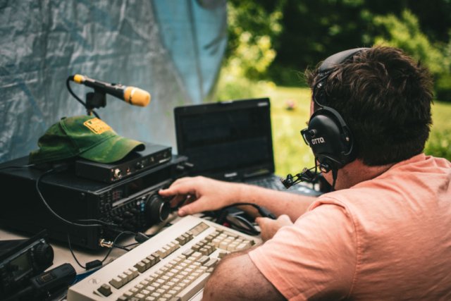 An attentive George (KC3AAD) tunes in on 80 meters.