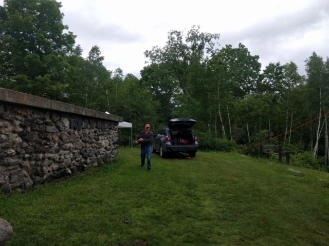 Alan K1MZM fishes fishing line out of a tree